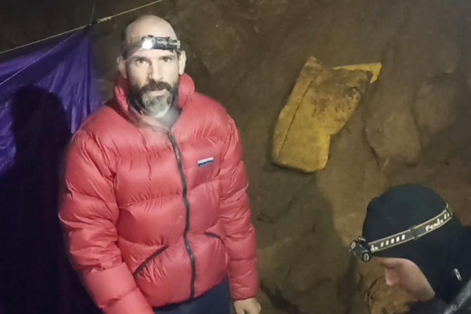 In this screen grab from video, American caver Mark Dickey, 40, talks to camera inside the Morca cave (AP)