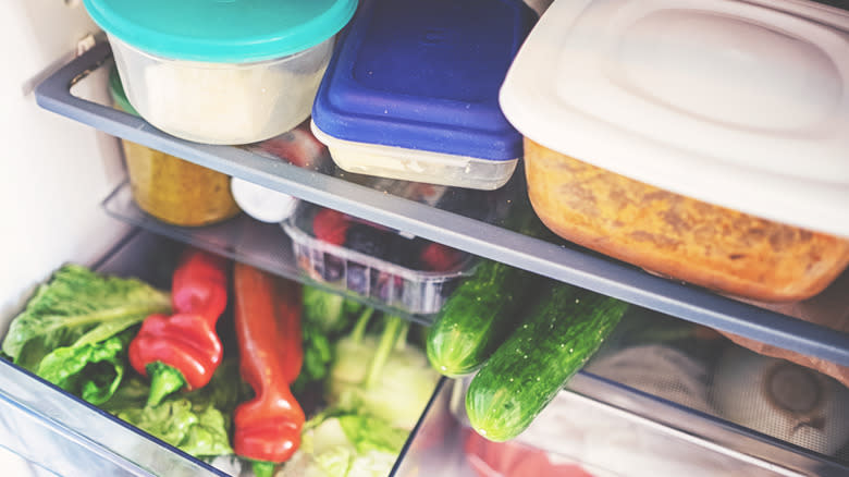 food containers and food inside refrigerator