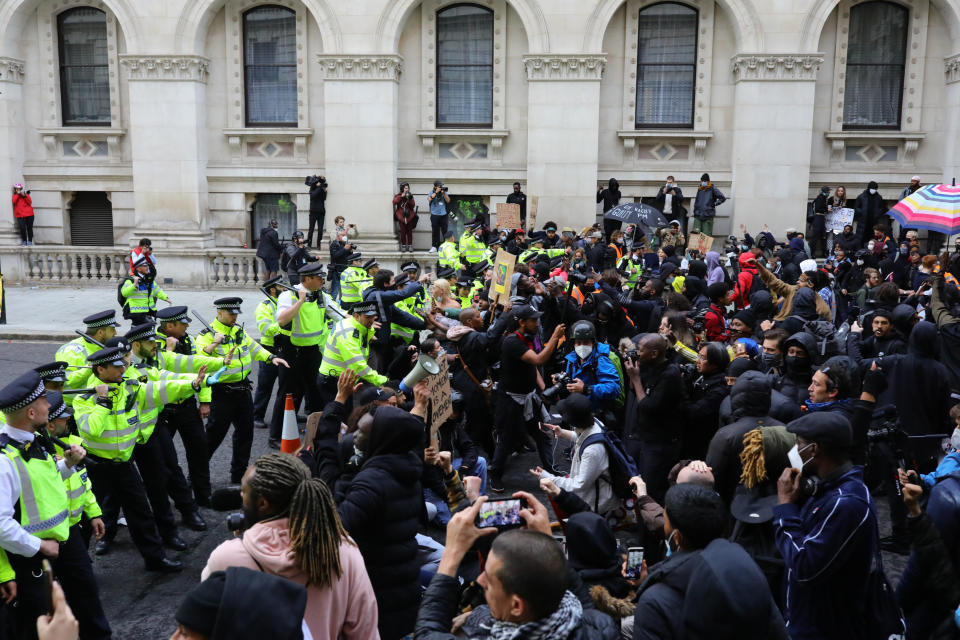 Police clash with protesters during a Black Lives Matter protest rally in Westminster, London, in memory of George Floyd who was killed on May 25. (PA)