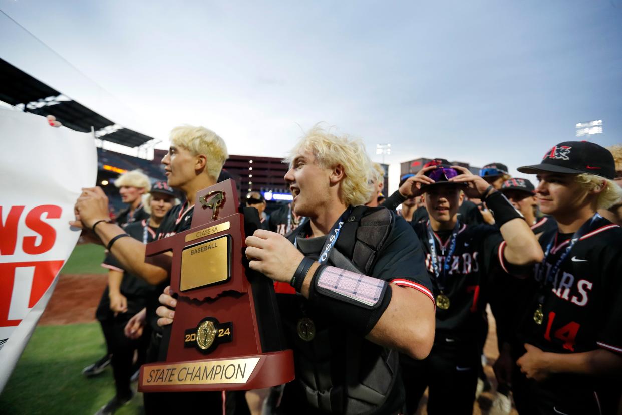 Westmoore celebrates the Class 6A baseball state championship over Sand Springs at Chickasaw Bricktown Ballpark in Oklahoma City, Saturday, May, 11, 2024.