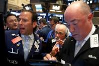 Traders work on the floor of the New York Stock Exchange (NYSE) in New York City, U.S., August 23, 2016. REUTERS/Brendan McDermid