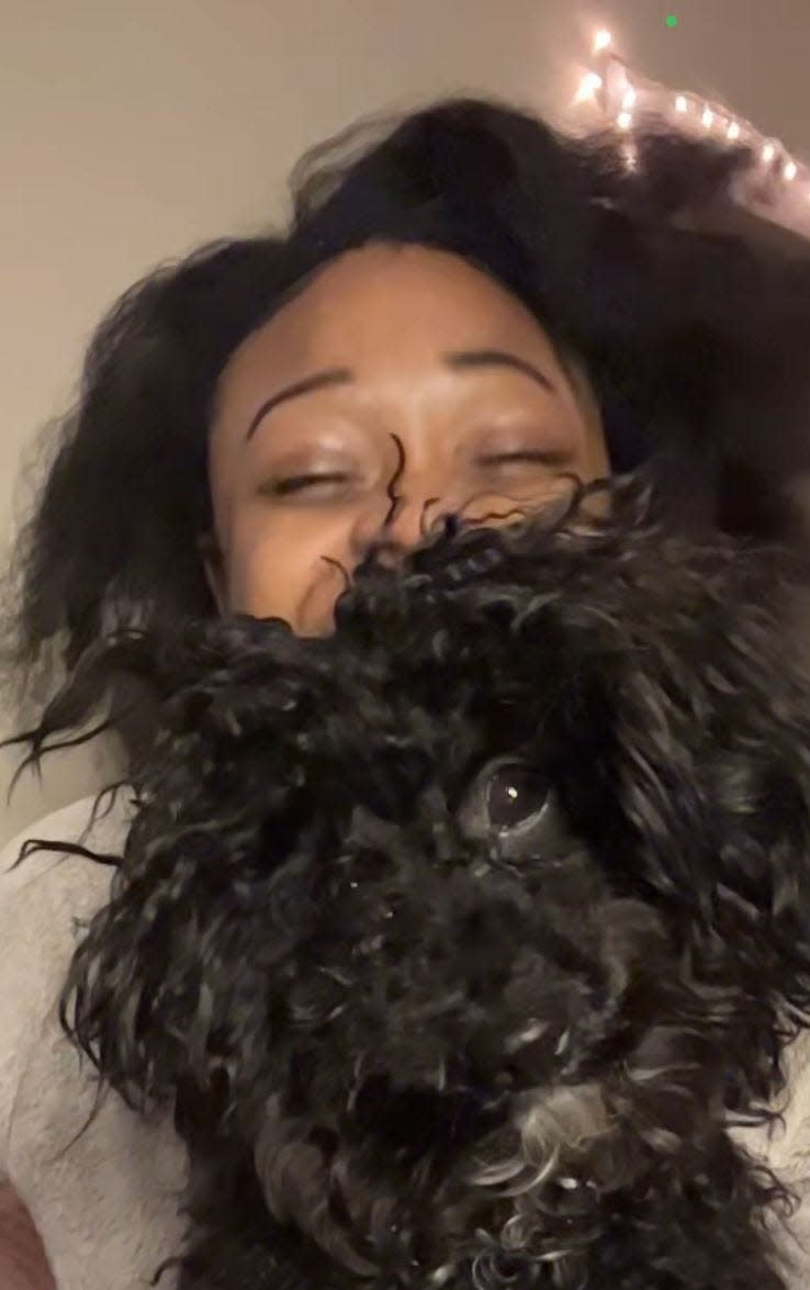 Zaiylah Bronson and her dog, Oliver. The 19-year-old lived in Kansas and was nearly 4 months pregnant with a baby boy when she died in August of 2023.