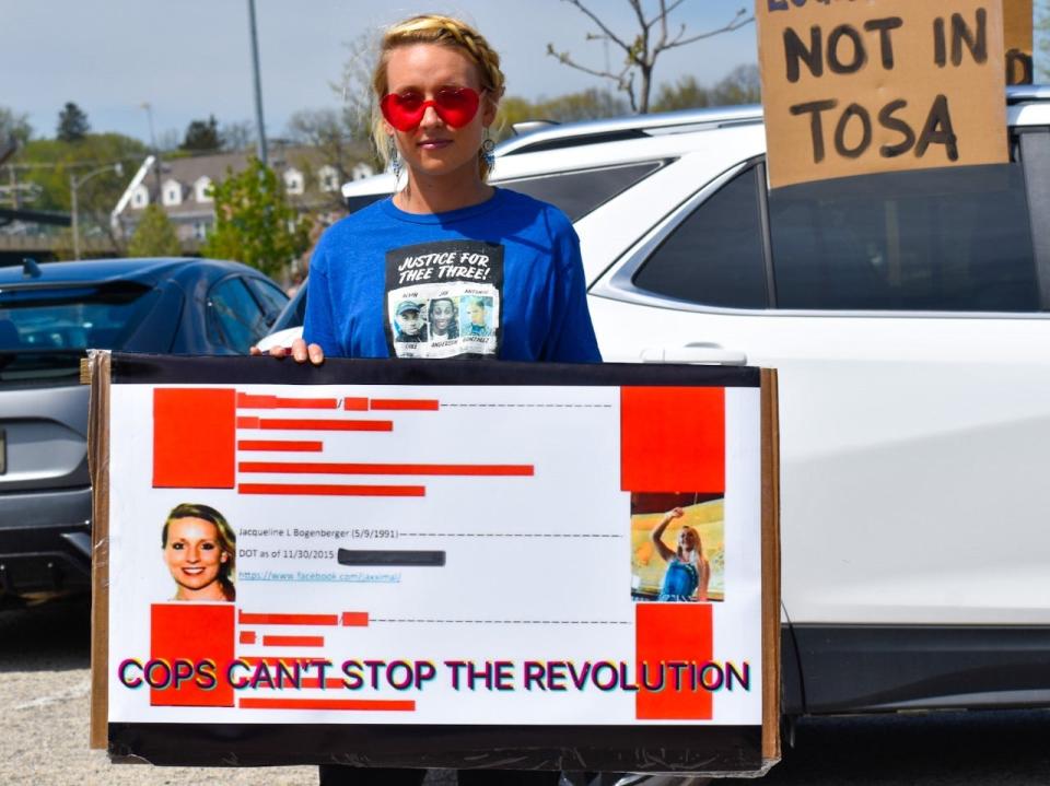 Jackie Bogenberger is one of the over 200 people who are a part of the "target list" created by Wauwatosa Police Department crime analyst Dominick Ratkowski. Her sign shows where she is on the list that's compiled of officials, activists, a local journalist, attorney and more.