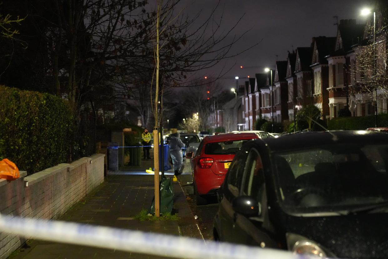 Police at the scene in Lessar Avenue near Clapham Common, south London, where a woman and her two young children have been taken to hospital after a man threw a suspected corrosive substance on Wednesday evening. Three other members of the public were also taken to hospital with injuries thought to have been suffered as they came to the aid of the woman and her children. Picture date: Thursday February 1, 2024.