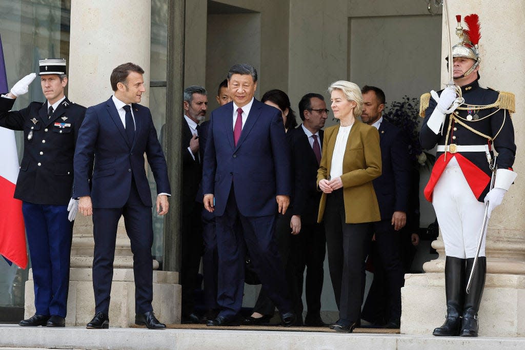 French President Emmanuel Macron, Chinese leader Xi Jinping, and European Commission President Ursula von der Leyen.