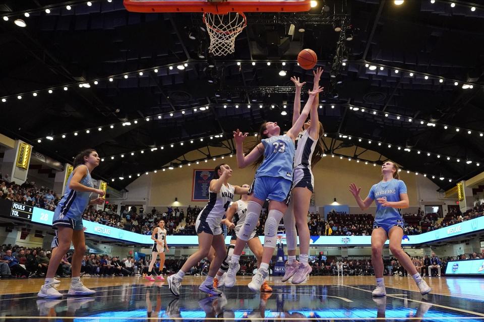 Putnam Valley's Jona Kabashi (24) and Westlake's Olivia Celaj (33) reach for a rebound in the Section 1 Class B girls basketball championship game at the Westchester County Center in White Plains on Friday, March 1, 2024.