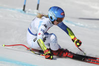 United States' Mikaela Shiffrin speeds down the course during an alpine ski, women's World Championships super G, in Meribel, France, Wednesday, Feb. 8, 2023. (AP Photo/Alessandro Trovati)