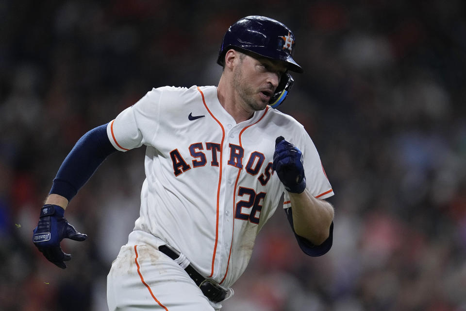 Houston Astros' Trey Mancini runs the bases after hitting an RBI-double during the sixth inning of a baseball game against the Oakland Athletics, Saturday, Aug. 13, 2022, in Houston. (AP Photo/Kevin M. Cox)