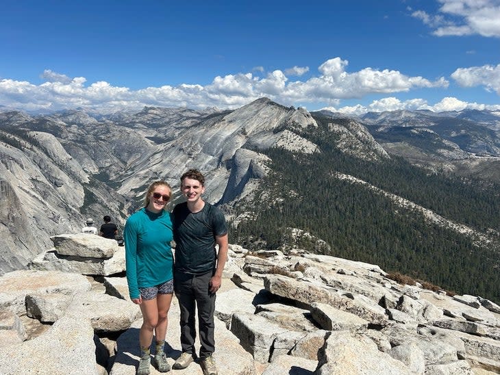 emma and aaron from the top of half dome