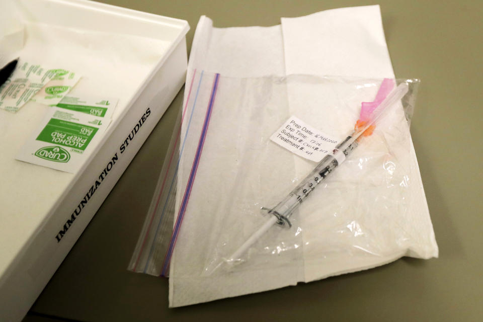 A syringe containing the first shot given in the first-stage safety study clinical trial of a potential vaccine for COVID-19. (Ted S. Warren / AP)