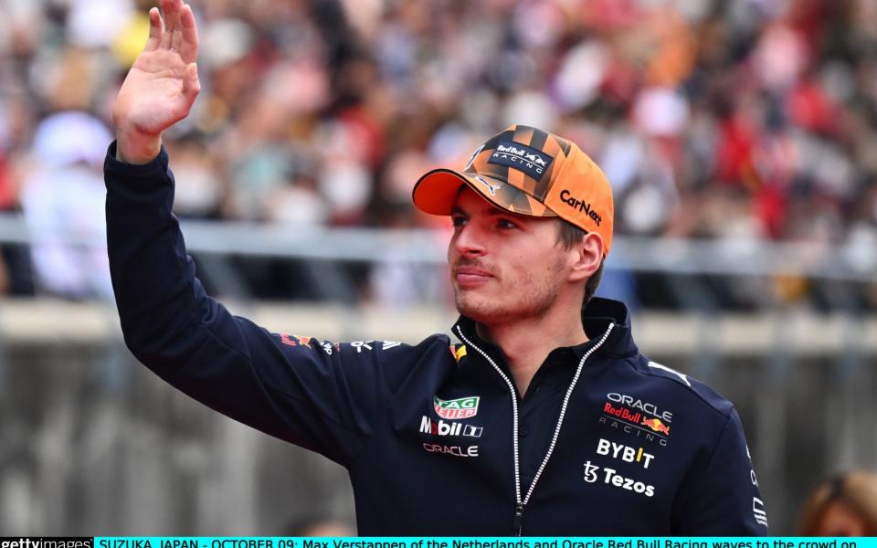 Max Verstappen of the Netherlands and Oracle Red Bull Racing waves to the crowd on the drivers parade prior to the F1 Grand Prix of Japan at Suzuka International Racing Course on October 09, 2022 in Suzuka, Japan - Getty Images