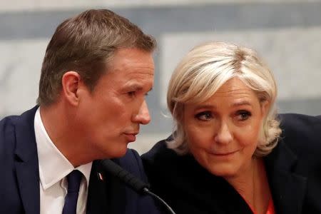 Marine Le Pen French National Front (FN) political party leader and candidate for French 2017 presidential election and Debout La France group former candidate Nicolas Dupont-Aignan attend a news conference in Paris, France, April 29, 2017. REUTERS/Charles Platiau