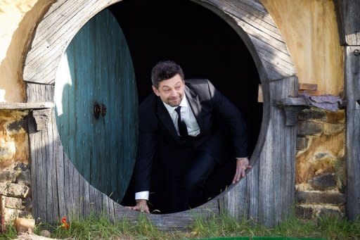 Actor Andy Serkis walks out onto the stage at the world premiere of "The Hobbit" in Wellington on November 28. A huge roar erupted as the cast slowly made their way down the red carpet at the New Zealand capital's entertainment strip