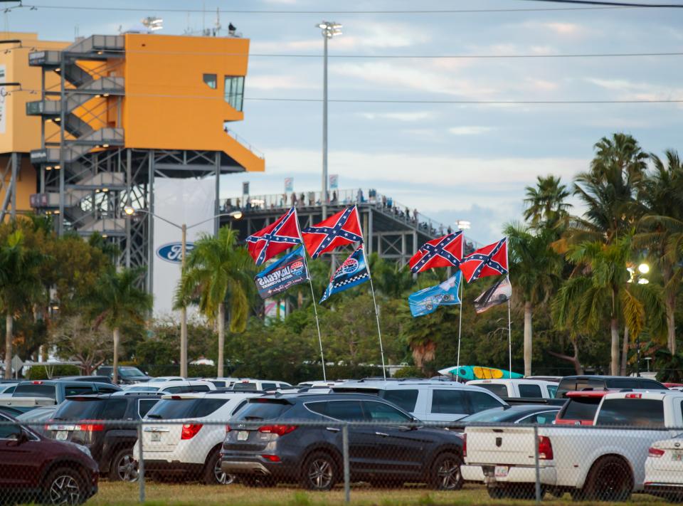 Confederate flags fly in the parking lot at Homestead-Miami Speedway in November 2018.