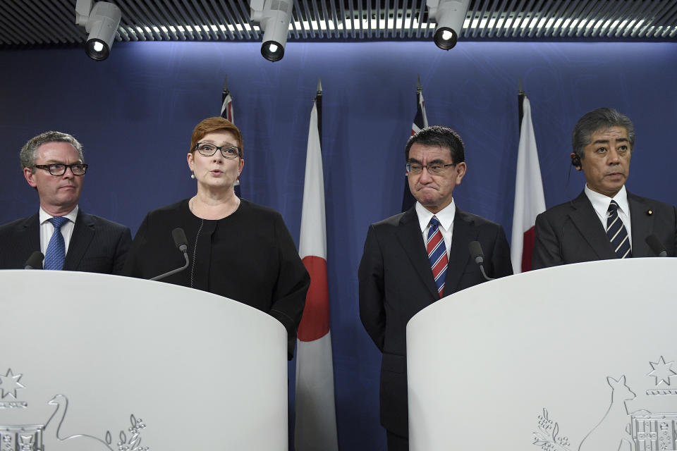 Australian Foreign Minister Marise Payne, second from left, speaks as Australian Defense Minister Christopher Pyne, left, Japanese Foreign Minister Taro Kono, second from right, and Japanese Defense Minister Takeshi Iwaya listen during a joint press conference in Sydney, Wednesday, Oct. 10, 2018. Australia and Japan on Wednesday reaffirmed their commitment to pressuring North Korea to abandon its nuclear weapons program and enforcing sanctions on Pyongyang. (Dan Himbrechts/AAP Images via AP)