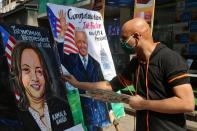 Artist applies finishing touches to painting of U.S. Vice President-elect Kamala Harris, in Mumbai
