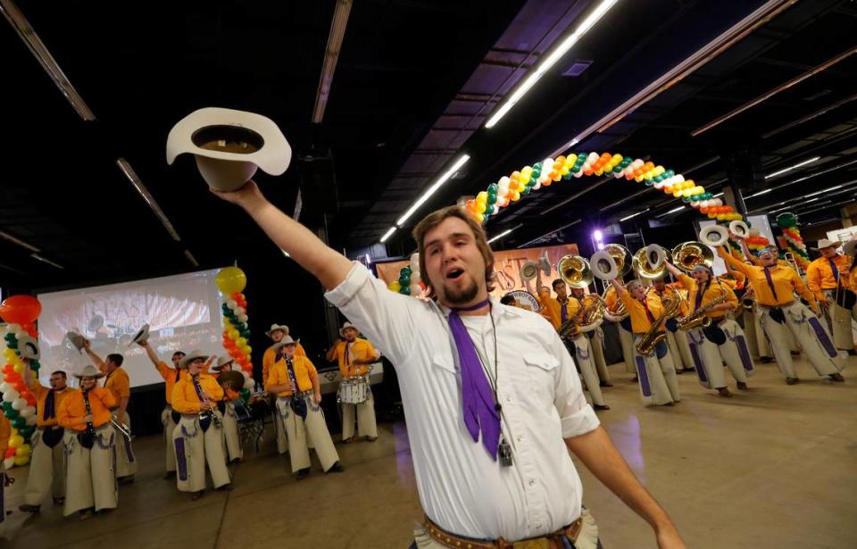Drum major David Spruiell leads the Cowboy Band from Hardin-Simmons University at the H-E-B/Central Market Feast of Sharing at Will Rogers Memorial Center on Nov. 12, 2013. RODGER MALLISON/Star-Telegram