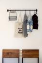 <p>Forget the giant coat rack that always topples over. This horizontal option takes up zero floor space, but offers the same amount of storage. Oh, and did we mention the basket is the perfect spot to drop your keys, so you're never hunting around the house for them?</p><p>See more at <a href="http://cupofjo.com/2013/04/los-angeles-home-tour/" rel="nofollow noopener" target="_blank" data-ylk="slk:Cup of Jo;elm:context_link;itc:0;sec:content-canvas" class="link ">Cup of Jo</a>.</p><p><a class="link " href="https://go.redirectingat.com?id=74968X1596630&url=https%3A%2F%2Fwww.ikea.com%2Fus%2Fen%2Fp%2Fhultarp-rail-black-00448769%2F&sref=https%3A%2F%2Fwww.countryliving.com%2Fhome-maintenance%2Fg37186772%2Fentryway-ikea-hacks%2F" rel="nofollow noopener" target="_blank" data-ylk="slk:BUY NOW;elm:context_link;itc:0;sec:content-canvas">BUY NOW</a> <strong><em>Rail, $95</em></strong></p>