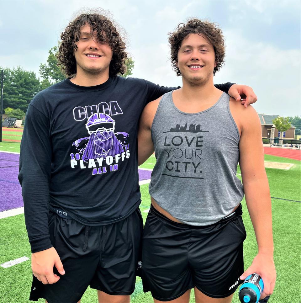 CHCA senior twin offensive linemen Charlton (left) and Mercer Luniewski as Cincinnati Hills Christian Academy had football practice July 17, 2023. Both twins have committed to play football for Michigan State.