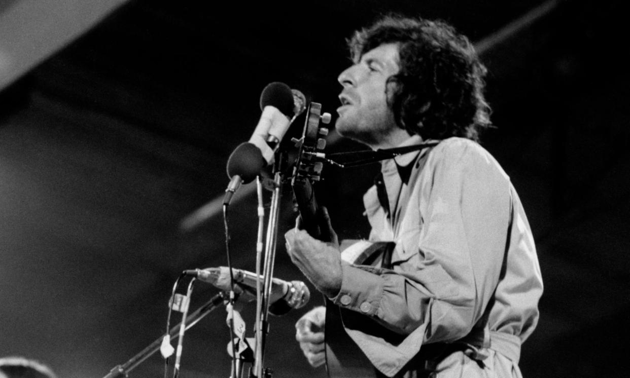 <span>Leonard Cohen performing at the Isle of Wight festival in August 1970.</span><span>Photograph: Tony Russell/Redferns</span>