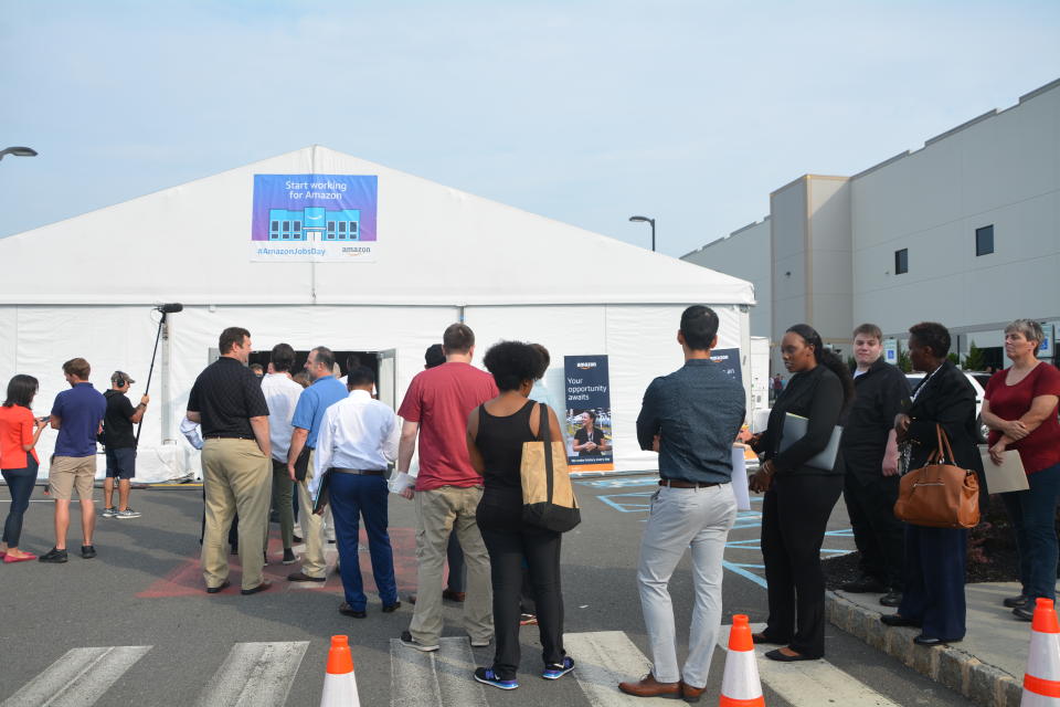 People waited outside a temporary building to get registered for the hiring process. The event started at 8 a.m. but people from New York, New Jersey and Pennsylvania were already in line by 7 a.m. (Krystal Hu/Yahoo Finance)