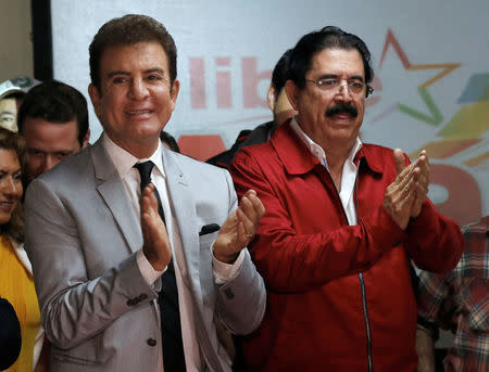 Former Honduran President Manuel Zelaya and Salvador Nasralla, presidential candidate of the Opposition Alliance Against the Dictatorship attend a news conference in Tegucigalpa, Honduras, December 4, 2017. REUTERS/Henry Romero