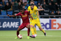 Soccer Football - Europa League - Astana vs Villarreal - Astana Arena, Astana, Kazakhstan - November 23, 2017 Villarreal's Cedric Bakambu in action with Astana’s Marin Anicic REUTERS/Alexei Filippov