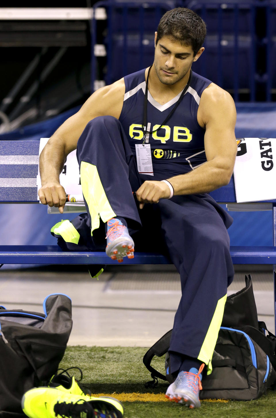 Eastern Illinois quarterback Jimmy Garoppolo sits on the bench before run the 40-yard dash at the NFL football scouting combine in Indianapolis, Sunday, Feb. 23, 2014. (AP Photo/Nam Y. Huh)