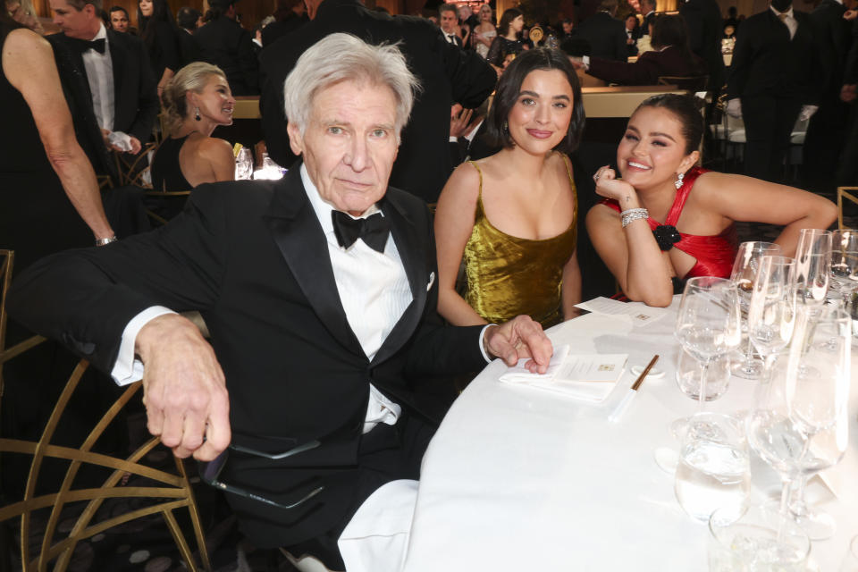 Harrison Ford and Selena Gomez, right, with an unidentified guest.