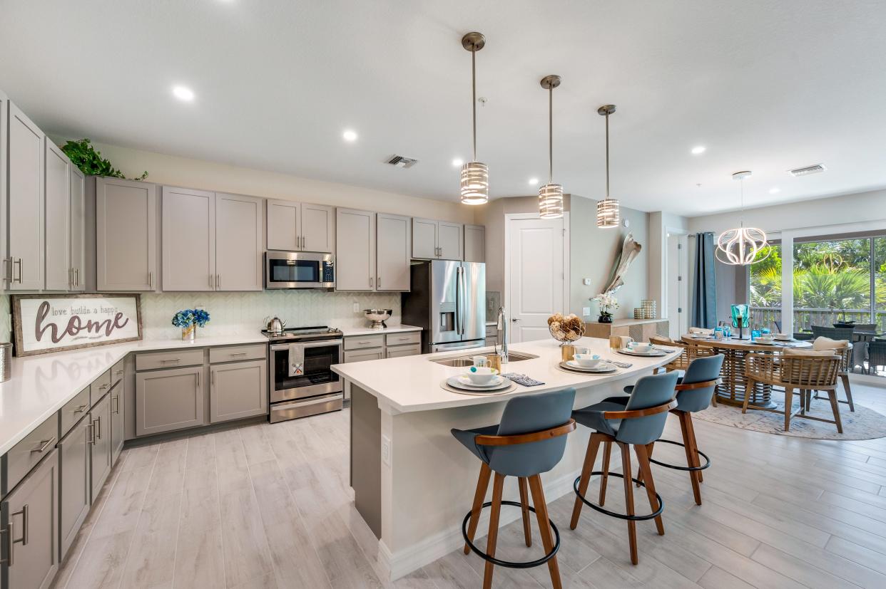 Phase 2 Montserrat units include 2,444 square feet under air and feature an additional built-in dry bar with upper cabinetry in the Kitchen and a rectangular, single basin sink in its central island.