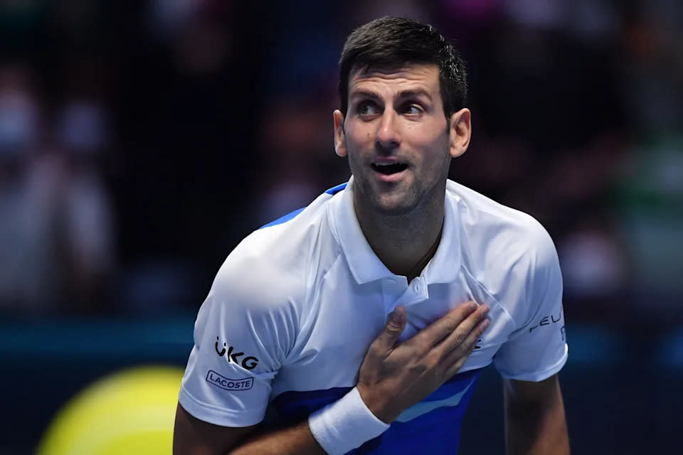 Novak Djokovic is pictured here reacting after a match in 2021.