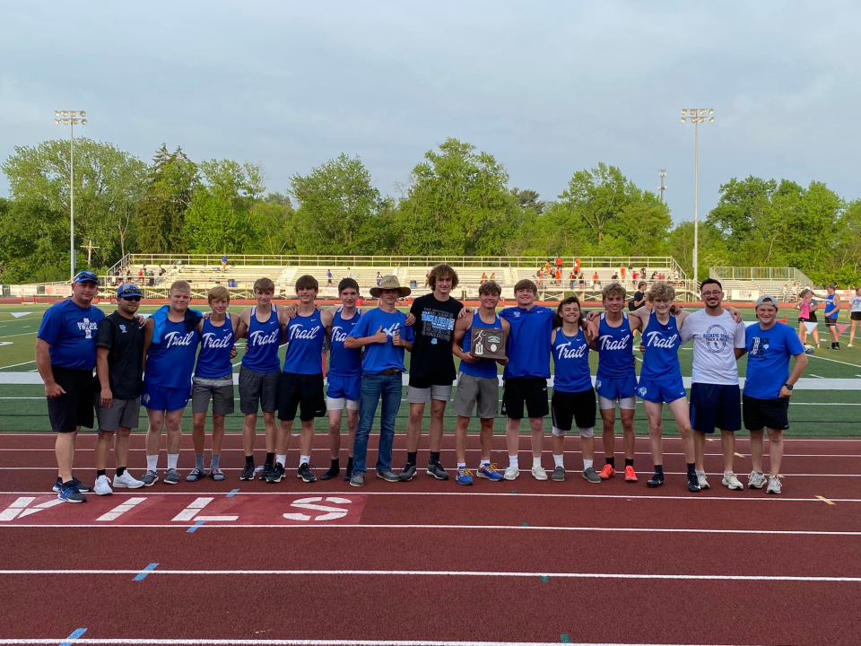 Buckeye Trail's Division III District runner-up boys team celebrates following Friday's action at St. Clairsville High School.