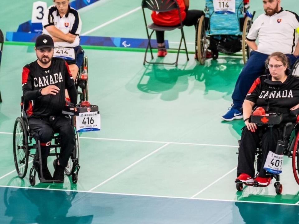 Canada's Alison Levine, right, and Iulian Ciobanu, both members of the last two Paralympic Games teams, defeated Japan 3-1 in the third-place match to capture Canada's lone medal at the World Boccia Championships. (Canadian Paralympic Committee - image credit)