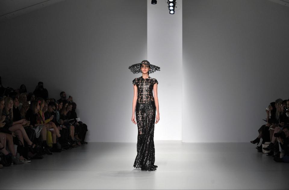 A model wears a design created by John Rocha at London Fashion Week Spring/Summer 2014 on Saturday Sept. 14, 2013 at Somerset House, London. (Photo by Richard Chambury/Invision/AP Images)