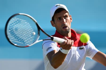 Tennis - ATP 500 - Fever-Tree Championships - The Queen's Club, London, Britain - June 24, 2018 Serbia's Novak Djokovic in action during the final against Croatia's Marin Cilic Action Images via Reuters/Tony O'Brien