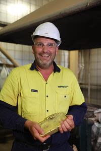 Novo’s GM, Operations, Mr. Chris Mardon, holding Novo’s inaugural gold bar from the Project.