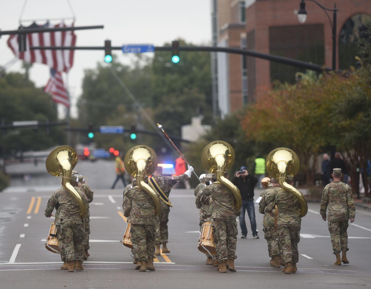 The 208th Army Band out of Concord perform during the Southeast North Carolina Veterans Day Parade in downtown Wilmington, N.C., Saturday, November 6, 2021. Approximately 85 entries participated in the annual event that ran along Third St.   [MATT BORN/STARNEWS]