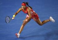 Serbia's Ana Ivanovic stretches to hit the ball during her third round match against Madison Keys of the U.S. at the Australian Open tennis tournament at Melbourne Park, Australia, January 23, 2016. REUTERS/Jason Reed