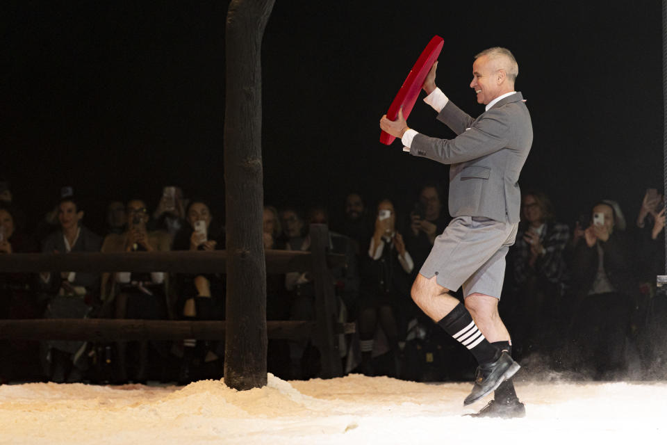 Fashion designer Thom Browne greets attendees at his eponymous label's fall/winter 2024 fashion show during New York Fashion Week, Wednesday, Feb. 14, 2024, in New York. (AP Photo/Peter K. Afriyie)