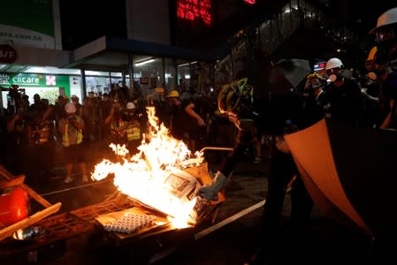 Demonstrators burn rubbish during a protest in Hong Kong
