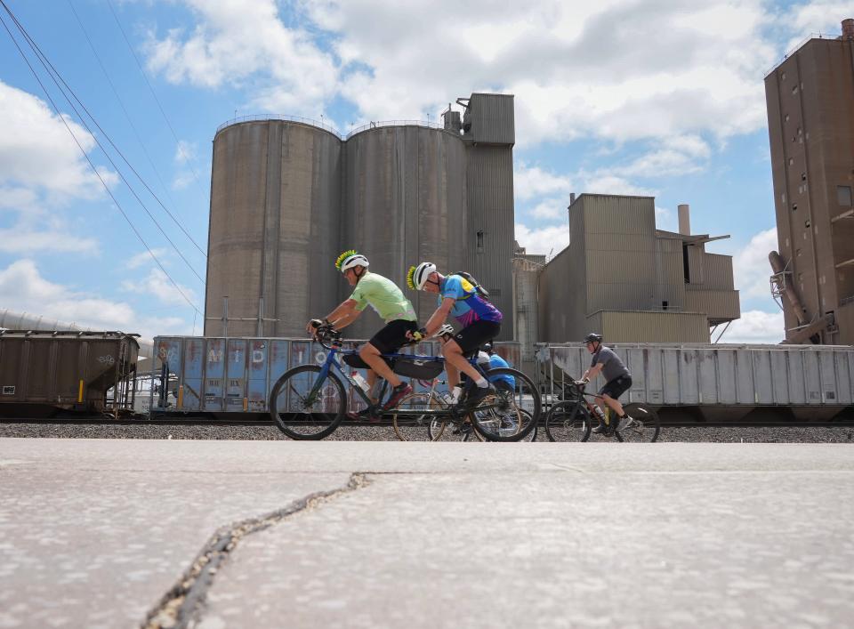 Cyclists make their way along the route between Buffalo and Davenport during RAGBRAI on Saturday.
