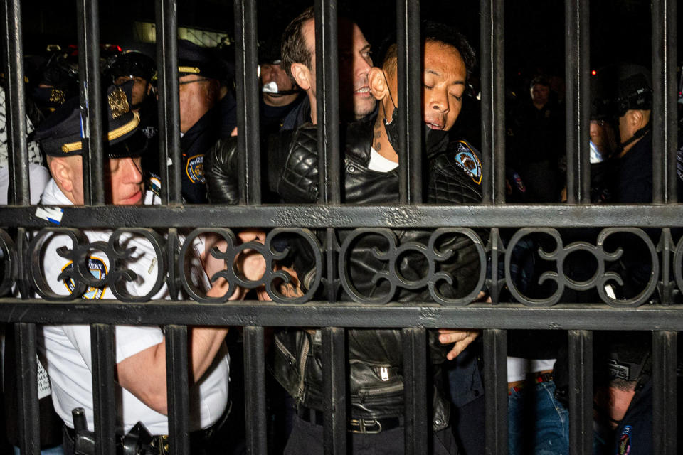 The NYPD arrest protesters outside the gates of Columbia University. (Alex Kent / Getty Images)