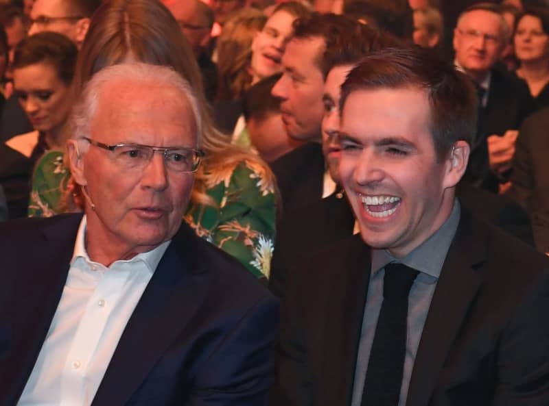 German retired footballer Philipp Lahm (R) and German former football player Franz Beckenbauer attend the opening gala of the Hall of Fame of German soccer at German Football Museum. Ina Fassbender/dpa