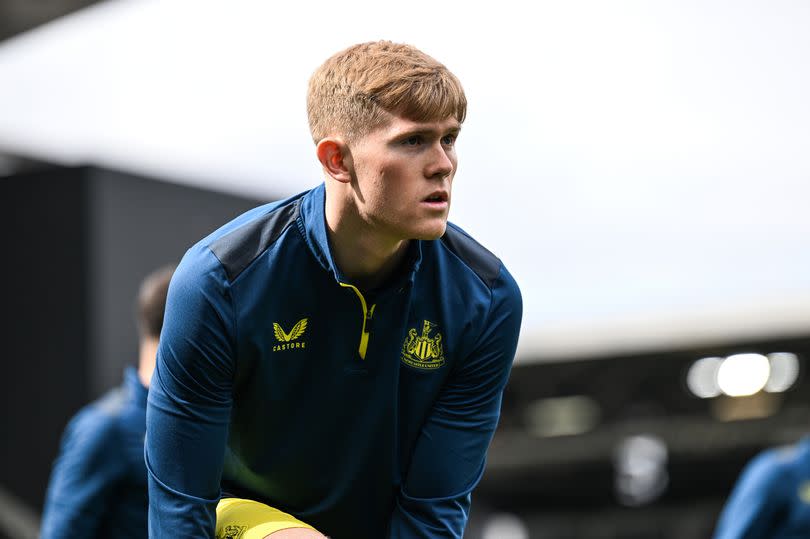 Lewis Hall of Newcastle United (20)  warms up during the Premier League match between Fulham FC and Newcastle United at Craven Cottage on April 06, 2024 in London, England.