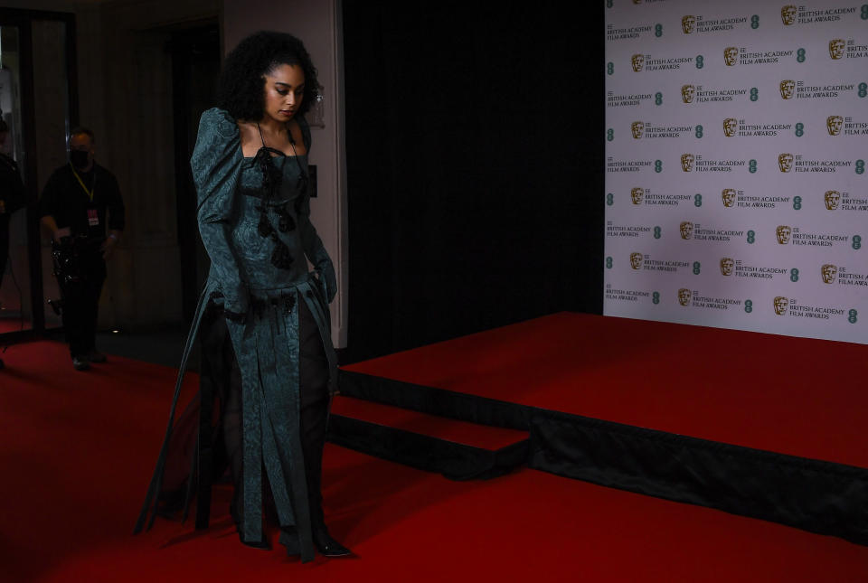 Singer Celeste Epiphany Waite arrives at the Bafta Film Awards, in central London, Sunday, April 11 2021. (AP Photo/Alberto Pezzali)