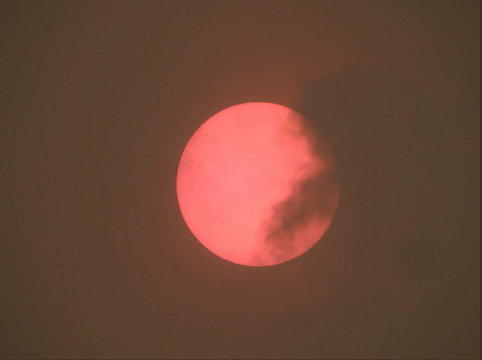 The sun burned bright red on Monday (Picture: PA)