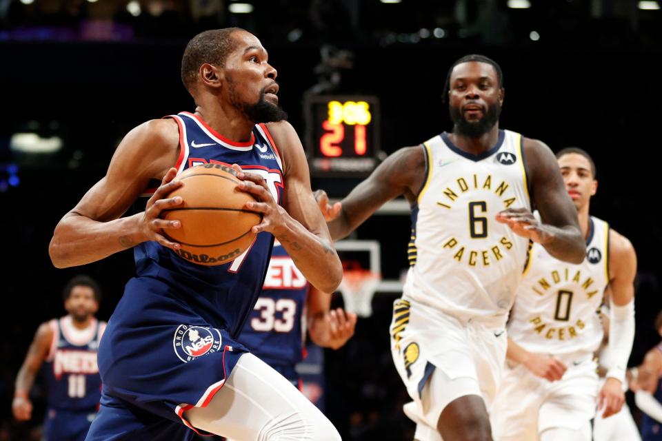 Kevin Durant (7) scored 20 points and added 10 rebounds and 16 assists in the Nets' 134-126 win over the Indiana Pacers on Sunday that clinched the No. 7 seed.