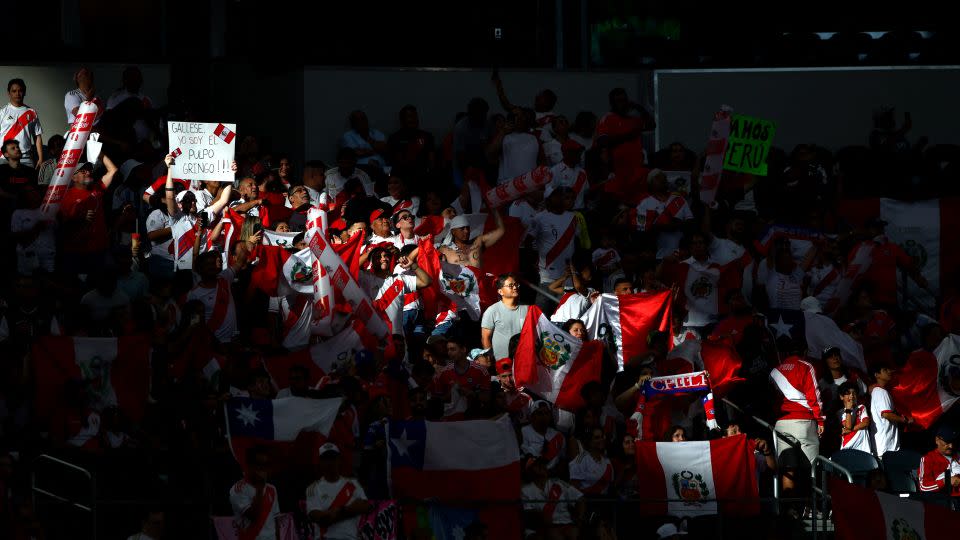 Peru's supporters cheer during a match between Peru and Chile at AT&T Stadium in Arlington, Texas, on June 21. - Aric Becker/AFP/Getty Images