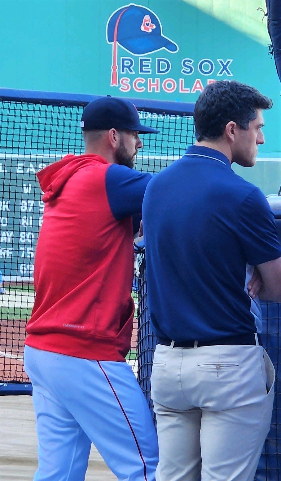 Portsmouth High School graduate Mike Montville, left, talks with former Boston Red Sox Chief Baseball Officer Chaim Bloom before a game last year against the Kansas City Royals. Montville, a hitting coach with Red Sox Triple-A affiliate Worcester Red Sox for the past three years, was told Monday the organization wasn't bringing him back in 2024.