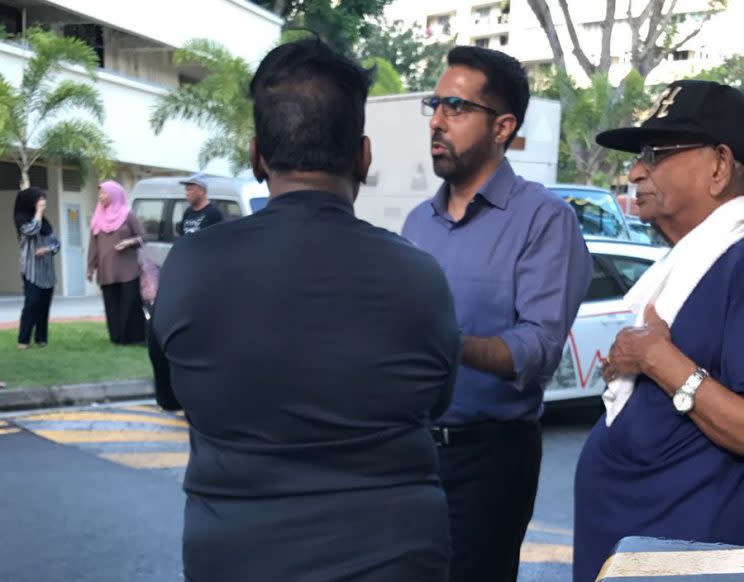 Aljunied GRC MP Pritam Singh spotted speaking with residents at the scene of a fire at Block 138 Bedok Reservoir Road on 20 February 2017. (PHOTO: Amrit Pal)